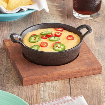 Valor 12 oz. Pre-Seasoned Mini Cast Iron Round Serving Bowl with Square Rustic Chestnut Finish Rubberwood Underliner