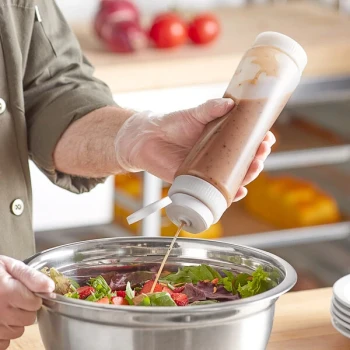 Vollrath Traex® 24 oz. Clear FIFO Squeeze Dispenser with White Flowcut™ Cap and Clear Base Cap
