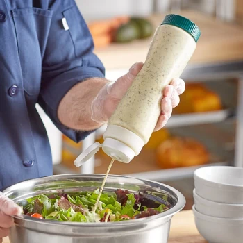 Vollrath Traex® 24 oz. Clear FIFO Squeeze Dispenser with White Flowcut™ Cap and Green Base Cap
