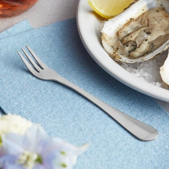 Choice Midland 5 1/2" 18/0 Stainless Steel Medium Weight Cocktail / Oyster Fork - 12/Case