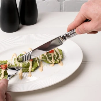 Libbey 578 5512 Fairfield 9 7/8" 18/0 Stainless Steel Heavy Weight Dinner Knife with Bolster - 36/Case