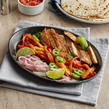 Choice 9 1/4" x 7" Oval Pre-Seasoned Cast Iron Fajita Skillet
