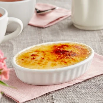 Tuxton BPK-0502 5 oz. Porcelain White Fluted Oval China Creme Brulee Dish - 12/Case
