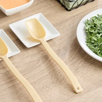 Cambro SPO10CW 0.75 oz. Beige Camwear® Solid Salad Bar / Buffet Spoon