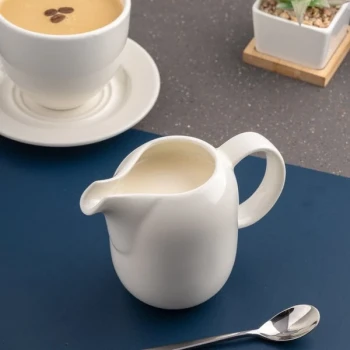 Ariane Vital Coupe 8.44 oz. Warm White Porcelain Creamer with Handle - 6/Case