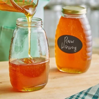 24 oz. (32 oz. Honey Weight) Classic Queenline Glass Honey Jar - 12/Case
