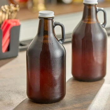 Libbey 70216 32 oz. Amber Growler with Lid - 12/Case