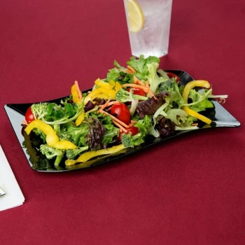 Fineline Wavetrends 1406-BK 6 1/2" x 10" Black Plastic Salad Plate - 120/Case