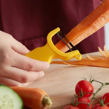 Mercer Culinary M33071YLB 4" Yellow "Y" Vegetable Peeler with Straight High Carbon Steel Blade