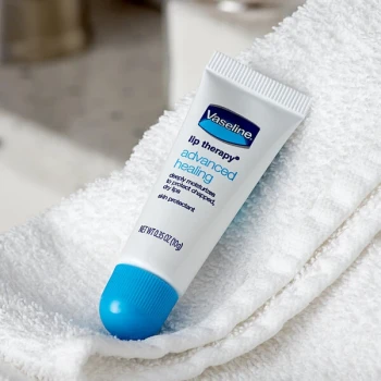 Vaseline 75000 0.35 oz. Advanced Healing Lip Therapy Lip Balm Tube - 72/Case