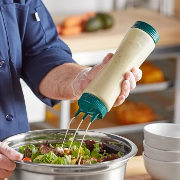 Vollrath Traex® 24 oz. Clear FIFO Squeeze Dispenser with Green Tri Tip™ Cap and Base Cap