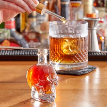 Acopa 1.7 oz. Glass Skull Bitters Bottle