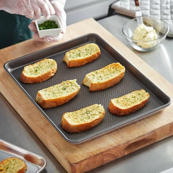 Vollrath 5303NSP Wear-Ever Half Size 18 Gauge Non-Stick 13 inch x 18 inch Wire in Rim Perforated Aluminum Bun / Sheet Pan