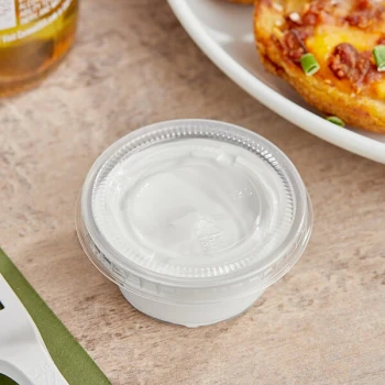 Choice 2 oz. Clear Plastic Souffle Cup / Portion Cup with PET Plastic Lid - 100/Case