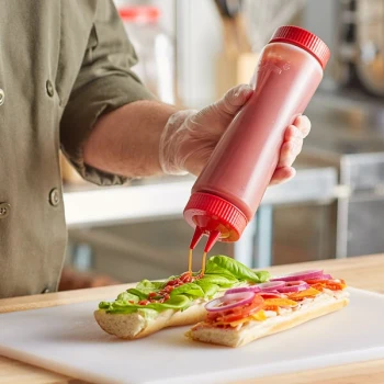 Vollrath Traex® 24 oz. Clear FIFO Squeeze Dispenser with Red Twin Tip™ Cap and Base Cap