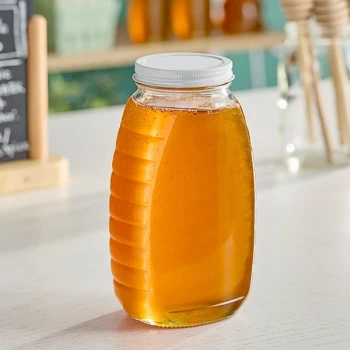 24 oz. (32 oz. Honey Weight) Classic Queenline Glass Honey Jar with Plastisol-Lined White Metal Lid - 96/Case