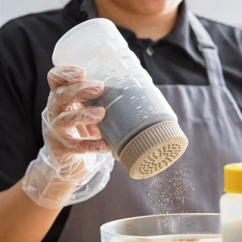 Vollrath 4961-1332 Traex® Dripcut® 16 oz. Polyethylene Shaker / Dredge with Medium-Hole Beige Lid