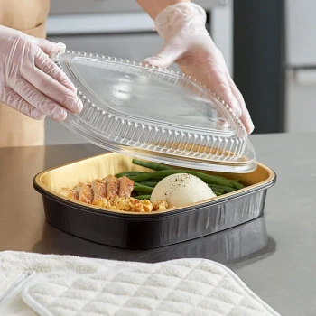 Choice Heavy Duty Smoothwall Black and Gold Large Oblong Foil Entree / Take-Out Pan with Dome Lid 65.6 oz. - 10/Pack