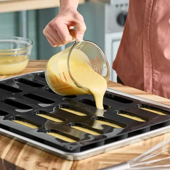 Pavoni Pavoflex 20 Compartment Oval Soft Silicone Baking Mold PX036 - 4 7/8 inch x 1 3/8 inch x 1 1/4 inch Cavities