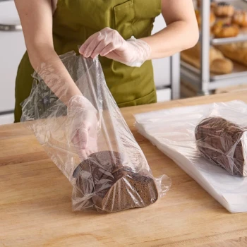Choice 11" x 4" x 17" 1 Mil Clear Gusseted LDPE Bread Bag on Wicket Dispenser - 1,000/Case