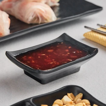 Acopa Izumi 1.5 oz. Matte Black Melamine Sauce Dish - 12/Pack