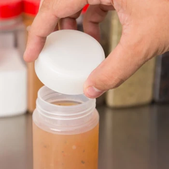 TableCraft 53FCAP Solid White End Cap for Inverted or Squeeze Bottles with a 53 mm Opening - 12/Pack