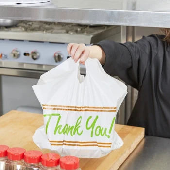 LK Packaging Plastic "Thank You" 16 1/2" x 6" x 14" Take Out Bag with Wave Handle - 500/Box