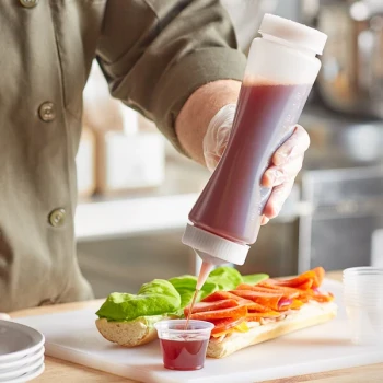 Vollrath Traex® 24 oz. Clear FIFO Squeeze Dispenser with Clear Single Tip Cap and Base Cap