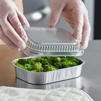 Choice Heavy Duty Smoothwall Silver Mini Oblong Foil Take-Out Pan with Dome Lid 16 oz. - 100/Case