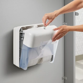 Tork OptiServe 473620 Coreless White Four Roll Toilet Tissue Dispenser T7 / T5
