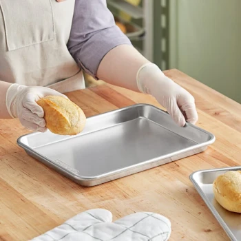 Nordic Ware Naturals 9 5/8 inch x 13 inch Quarter Size 20 Gauge Wire in Rim Aluminum Bun / Sheet Pan 45300