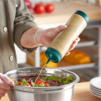 Vollrath Traex® 24 oz. Clear FIFO Squeeze Dispenser with Green Single Tip Cap and Base Cap