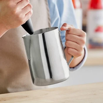 Acopa 33 oz. Stainless Steel Frothing Pitcher with Measuring Lines