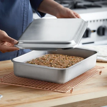 Nordic Ware Naturals 13 inch x 9 inch x 2 1/2 inch Rectangular 20 Gauge Aluminum Cake Pan with Cover 46320