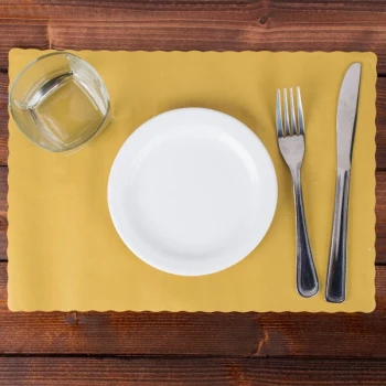 Hoffmaster 310560 10" x 14" Gold Colored Paper Placemat with Scalloped Edge - 1,000/Case