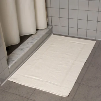 Oxford Vicenza Avorio 21" x 36" 100% Ringspun Combed Cotton Bath Mat with Dobby Border 12 lb. - 48/Case