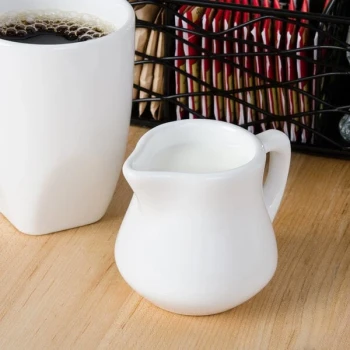 Tuxton BWR-035 3.5 oz. White China Creamer Pourer - 12/Case
