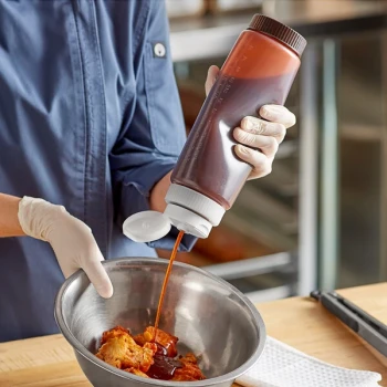 Vollrath Traex® 24 oz. Clear FIFO Squeeze Dispenser with White Flowcut™ Cap and Brown Base Cap