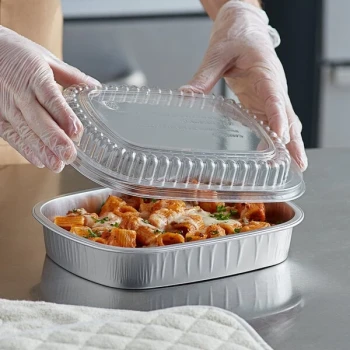 Choice Heavy Duty Smoothwall Silver Medium Oblong Foil Entree / Take-Out Pan with Dome Lid 47.4 oz. - 10/Pack
