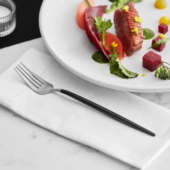 Acopa Odin Black / Silver 8 7/8" 18/8 Brushed Stainless Steel Extra Heavy Weight Forged Dinner Fork - 12/Case