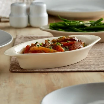 Acopa 12 oz. Ivory (American White) Oval Stoneware Rarebit - 12/Pack