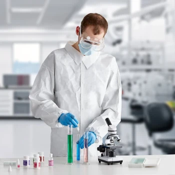 Lavex White 53 GSM Heavy Weight Microporous Polypropylene Snap Front Long Sleeve Lab Coat with Elastic Wrists - M - 30/Case
