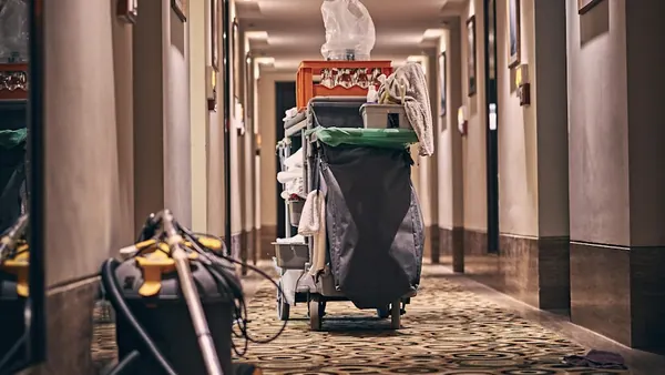 Housekeeping cart in a hotel corridor