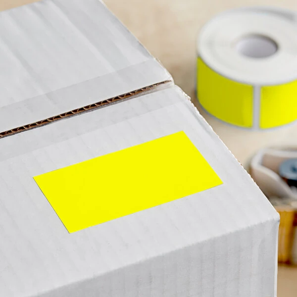 Lavex 2" x 4" Bright Yellow Semi-Gloss Paper Permanent Rectangular Inventory Label - 500/Roll