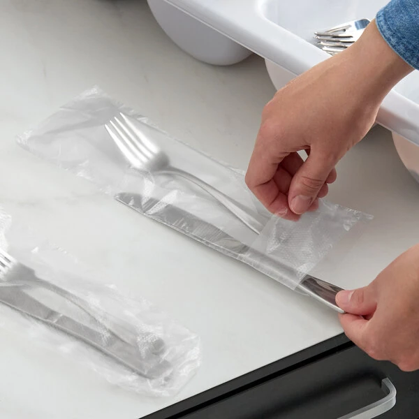 Choice 3 1/2" x 10" Unprinted Plastic Deli / Silverware Saddle Bag with Flip Top - 2,000/Case