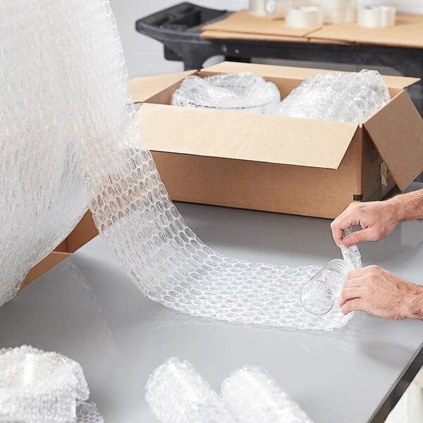 Lavex 12" x 100' Medium 5/16" Parcel Ready Perforated Bubble Roll