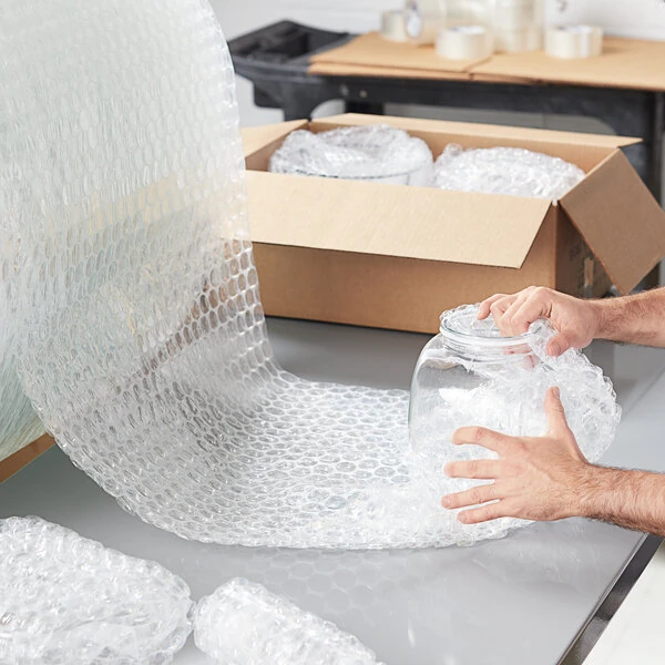 Lavex 24" x 100' Medium 5/16" Parcel Ready Perforated Bubble Roll