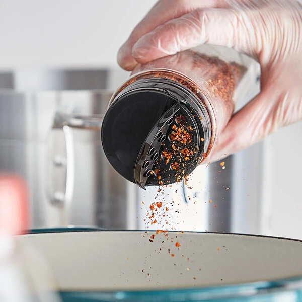 63/485 Black Dual-Flapper Induction-Lined Spice Lid with 7 Holes - 575/Case