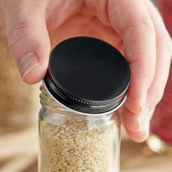 48/400 Black Metal Lid with Plastisol Liner - 2,400/Case