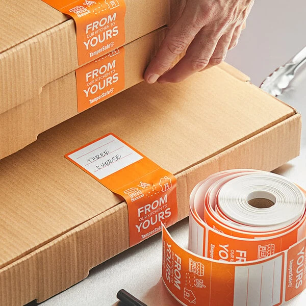 Choice TamperSafe 2 1/2" x 6" From Our Kitchen To Yours Orange Paper Tamper-Evident Label - 250/Roll